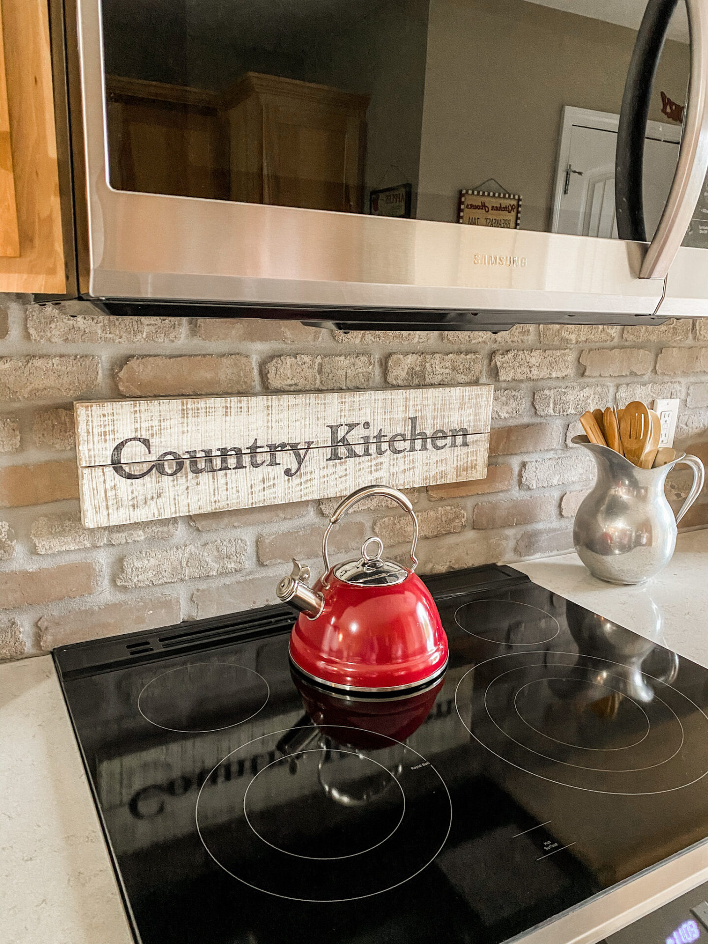 beautiful country kitchen with custom, hand painted sign.