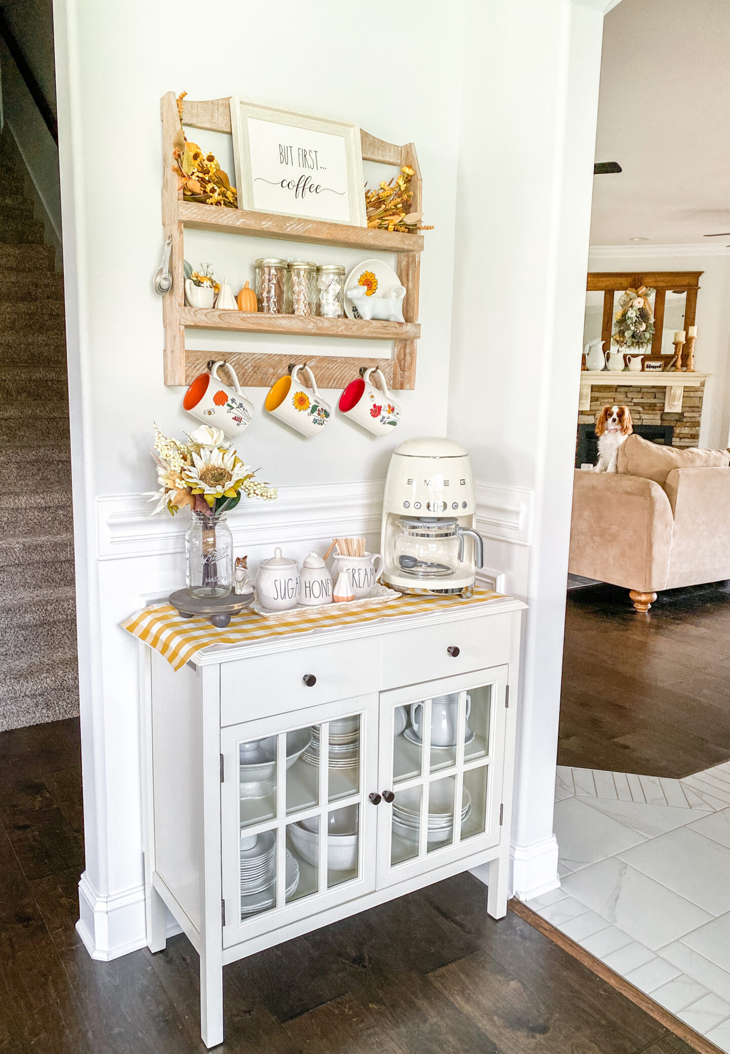 fall coffee bar decor in a warm setting. small space decor. cavalier king charles spaniel in the background